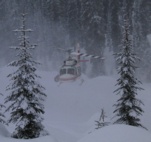 Friday, 3-12-2004  Helicopter in the Selkirks with heavy snowfall.